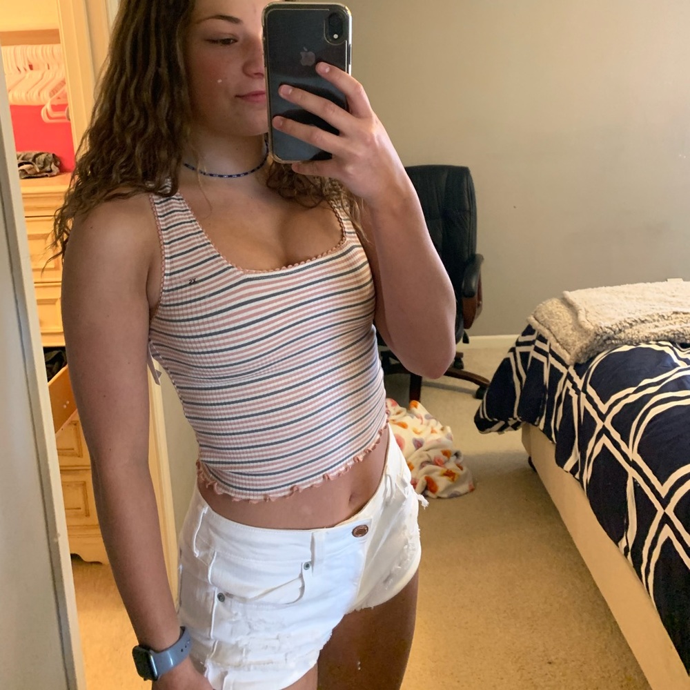 Super cute tank top with ruffles at the bottom!